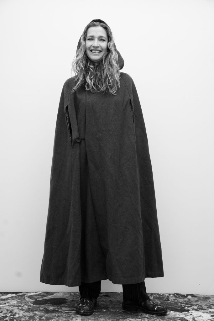 Janaina Tschäpe pictured wearing a hooded cape.